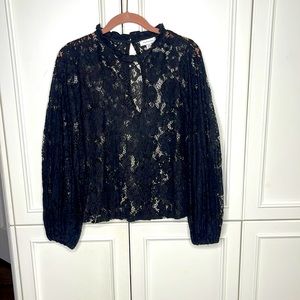 TOPSHOP black lace balloon arm shirt.  Adorable and sexy
